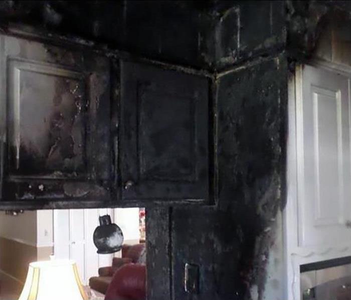 Soot and fire damage in a kitchen